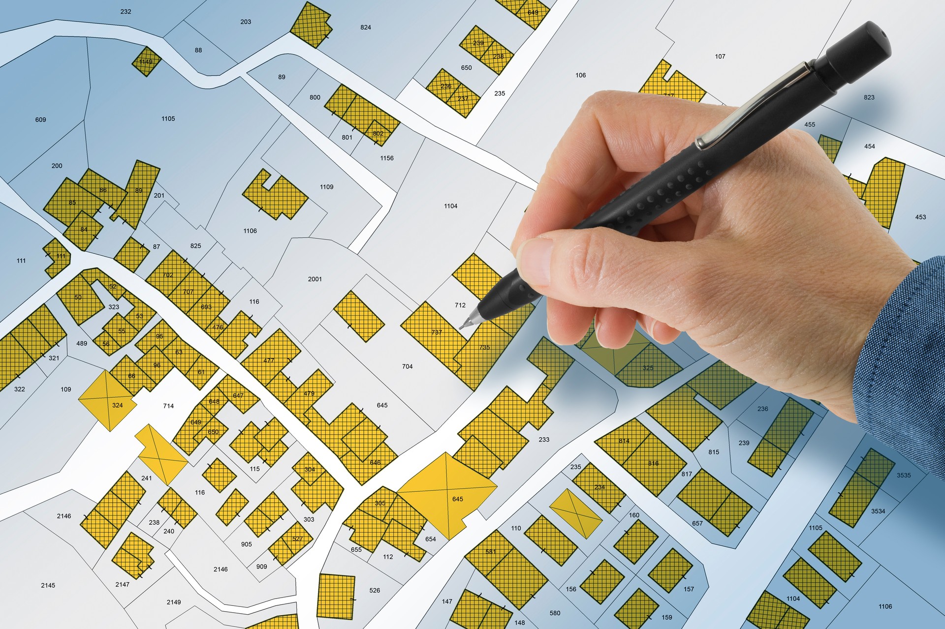 Imaginary cadastral map with buildings, land parcel and vacant plot - Land records and property registry concept with cadastre documentation and ownership parcel identification